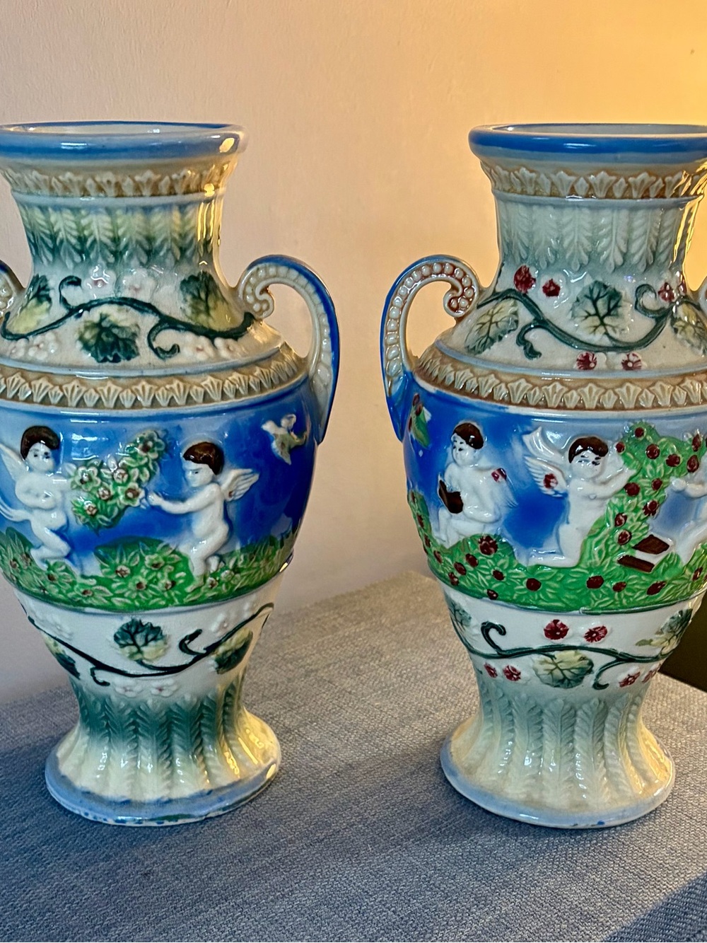 Source Unknown Blue and Green Cherub Relief Vases (Pair)